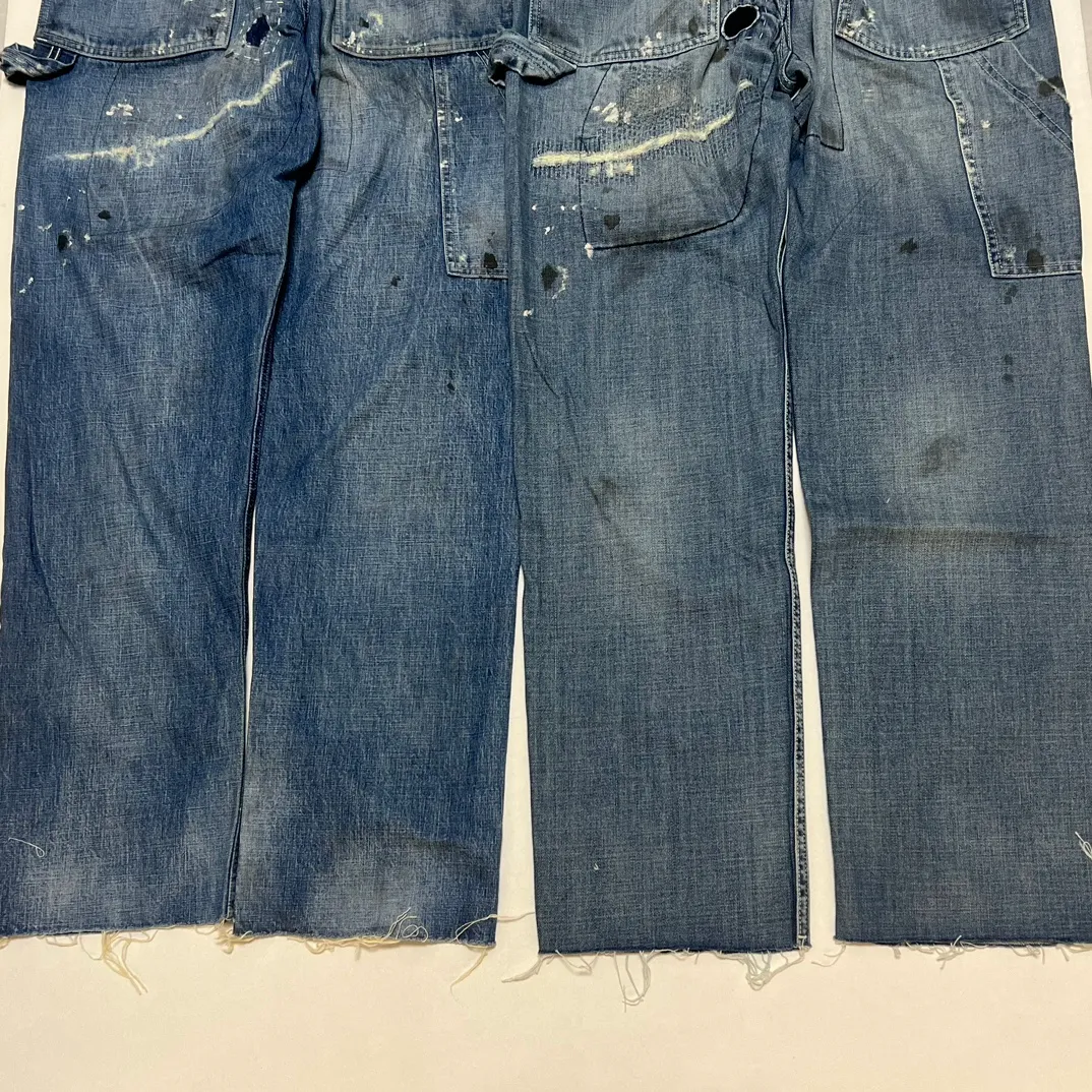 Proofing VS ZP SAINT Mxxxxxx SAINT_DENIM PANTS/PAINTER /BLUE Knife cut holes and splashed ink logging trousers Patch jeans Blue S-XL All accessories are molded and customized Super heavy work Washed and worn Knife cut holes Artificial ink splashed graffiti Genuine version Loose and stylish
